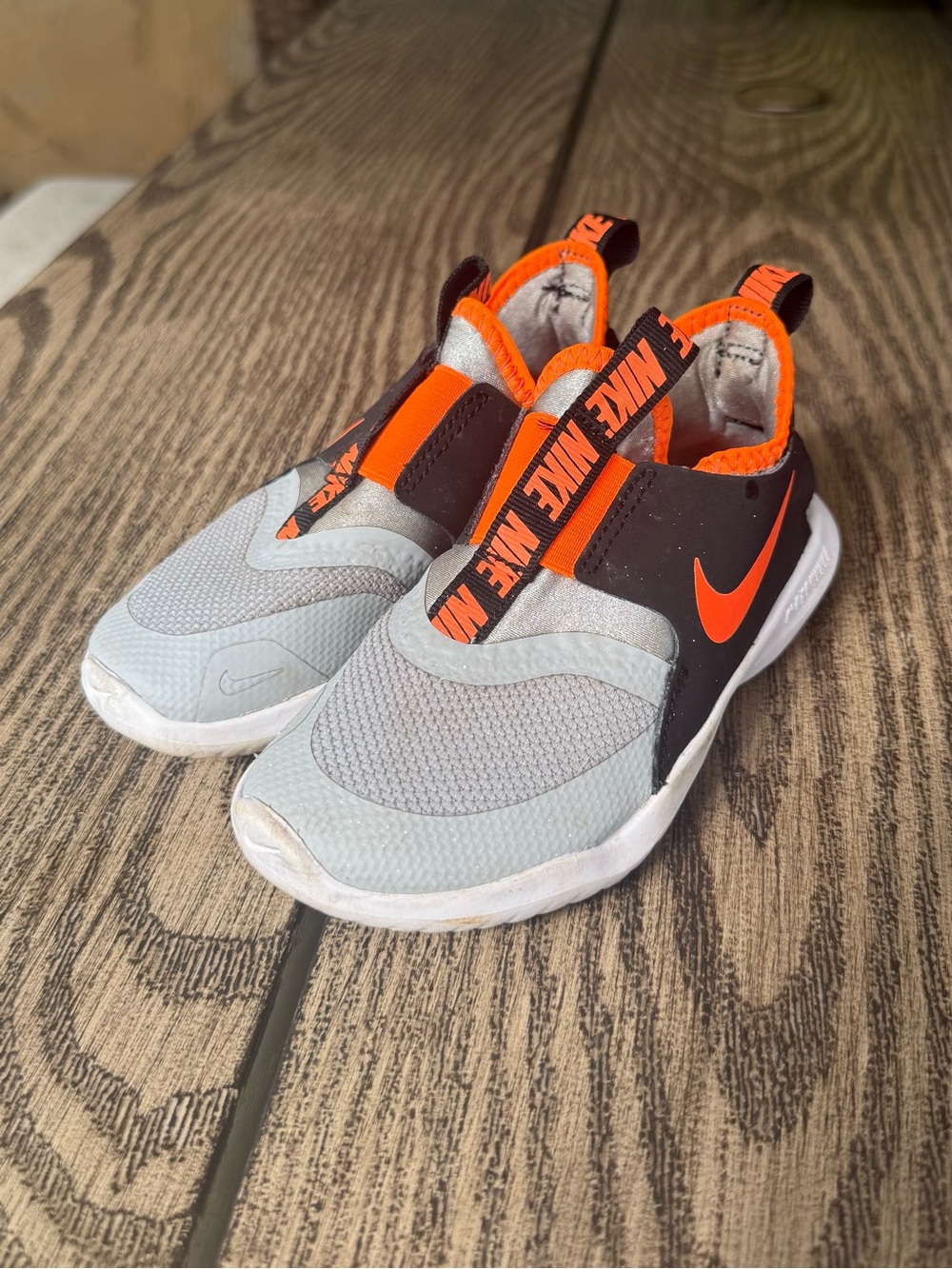 Nike Kids Slip-On Sneakers in Gray and Orange